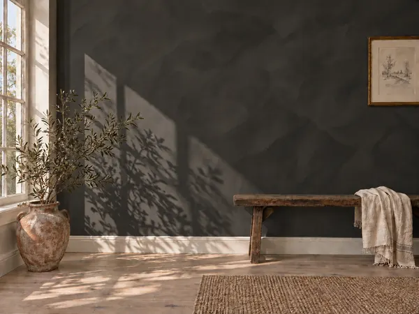 A wall finished in Charcoal limewash.