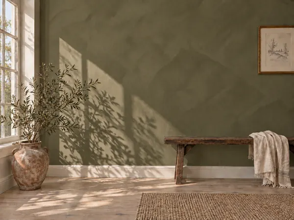 A wall finished in Olive limewash.